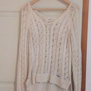 White knit sweater with holes